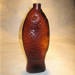 Antique fish bottle glass art repaired by Michael Bokrosh
