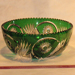 Antique green cut bowl glass art repaired by Michael Bokrosh