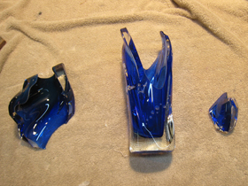 Contemporary blue vase glass art sculpture broken Contemporary blue vase glass art sculpture broken