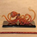 Contemporary glass octopus art repaired by Michael Bokrosh