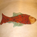 Contemporary glass red fish art repaired by Michael Bokrosh